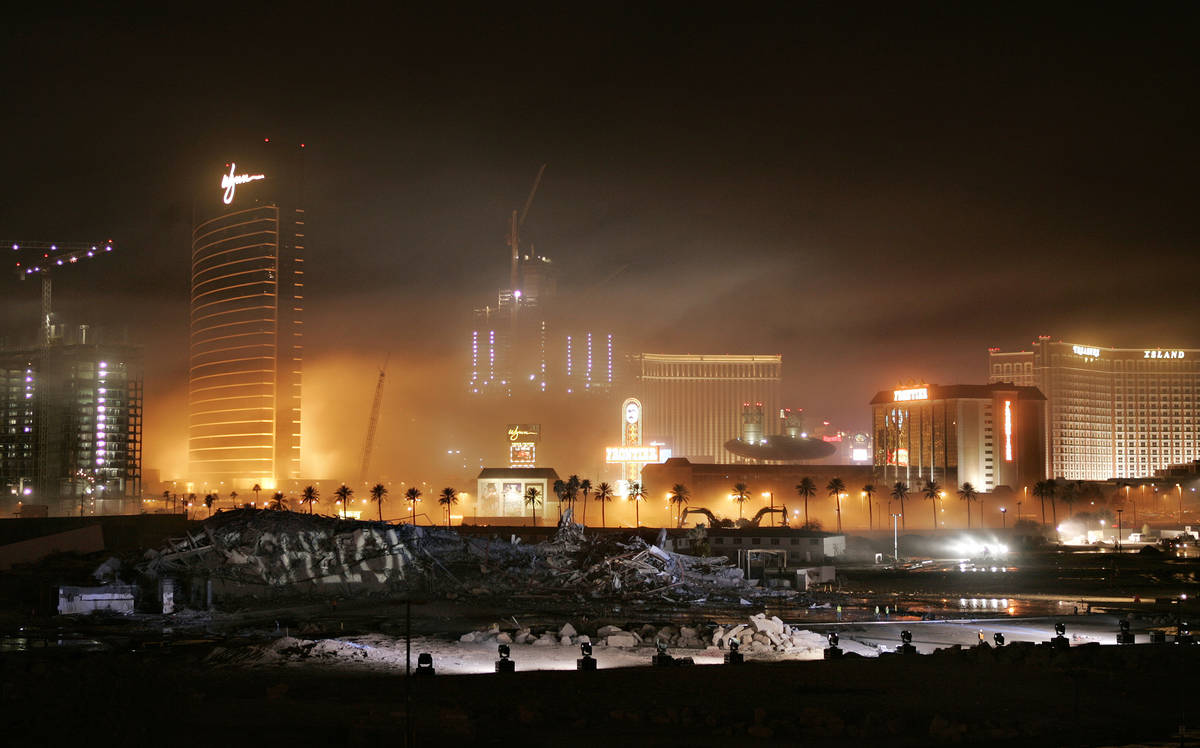 Dust hangs in the air after the Stardust was imploded early Tuesday morning, March 13, 2007, on ...