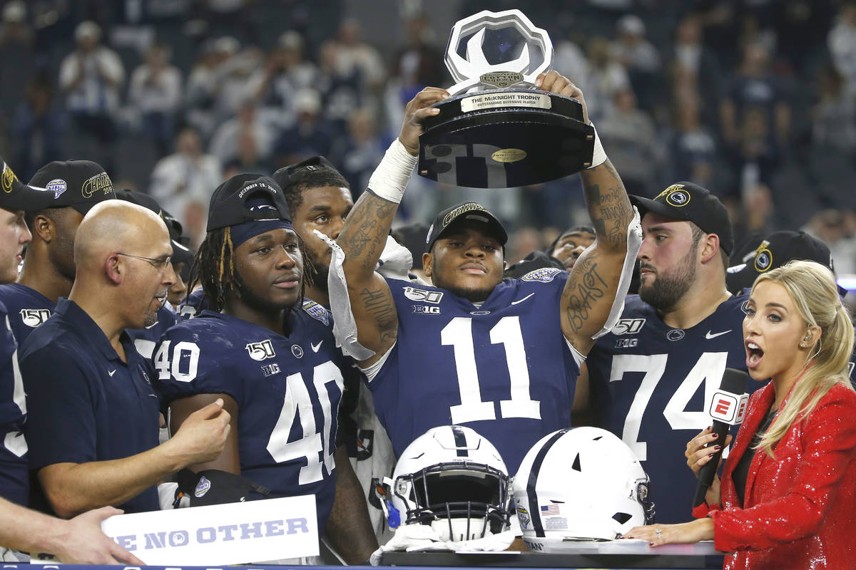 Penn State linebacker Micah Parsons (11) celebrates with his team following the 53-39 win over ...