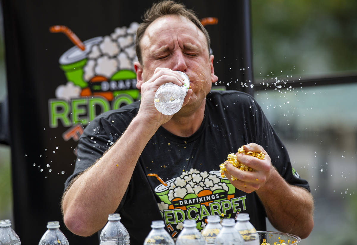 Competitive eating world champion Joey Chestnut competes in the World Popcorn Eating Championsh ...