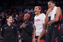 Las Vegas Aces guard Kelsey Plum (10), Las Vegas Aces guard Jackie Young (0), Las Vegas Aces ce ...