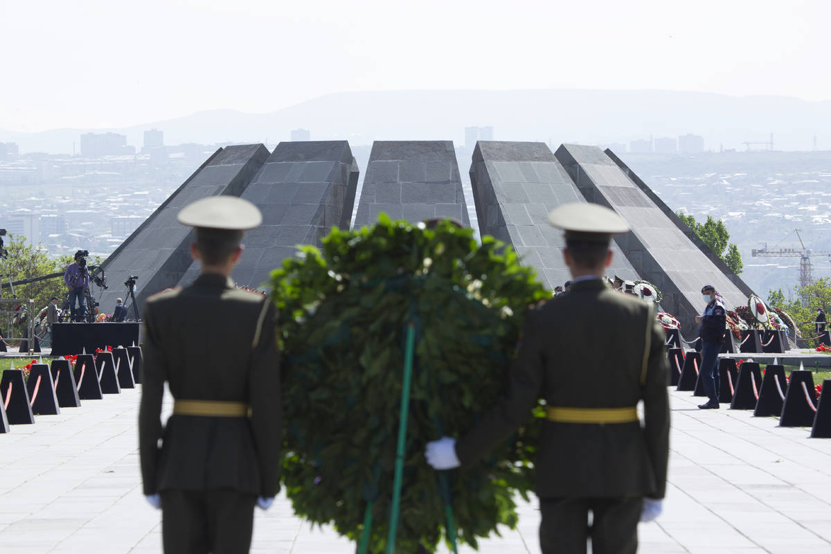 Armenian honor guards attend a memorial service at the monument to the victims of mass killings ...