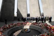 Armenian Prime Minister Nikol Pashinyan, center, attends a memorial service at the monument to ...