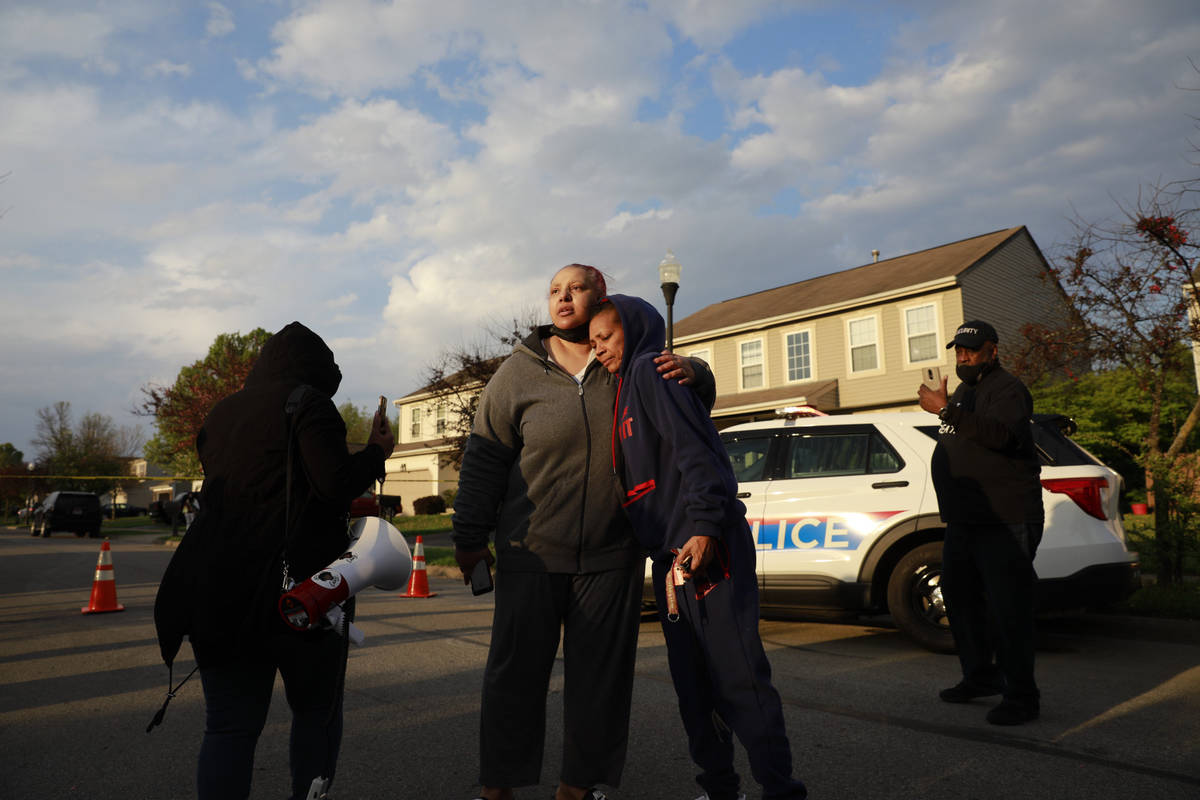 Hazel Bryant is embraced after addressing a crowd with her anger at the Columbus Police over th ...