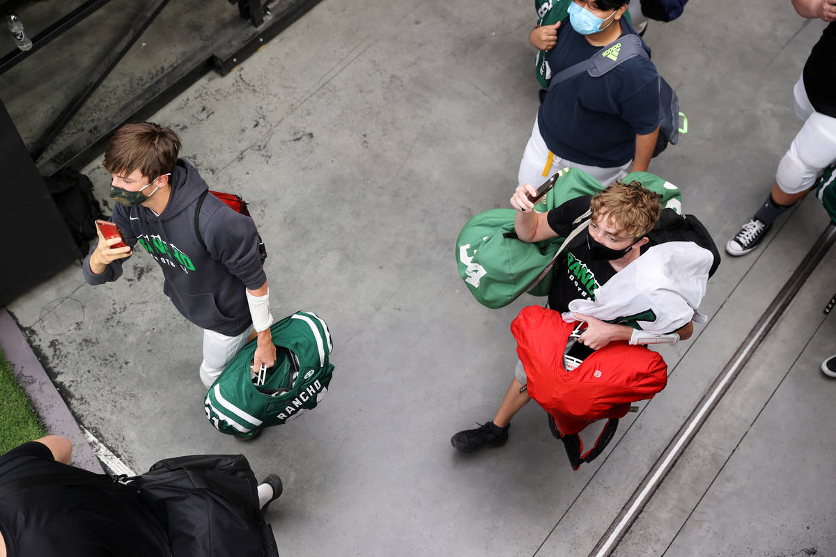 Rancho players enter Allegiant Stadium in Las Vegas for a team football practice, Saturday, Apr ...
