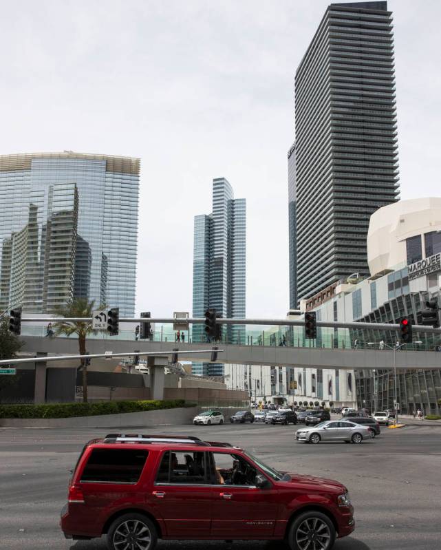 Aria, left, located within CityCenter, is seen on the Las Vegas Strip, on Monday, April, 26, 20 ...