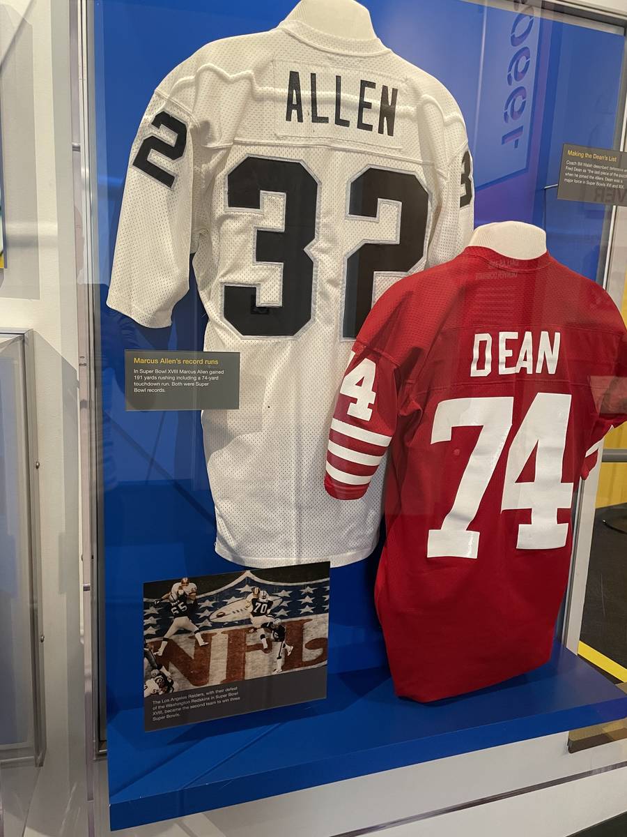 The jersey of Marcus Allen of the Raiders and former 49ers lineman Fred Dean and displayed in t ...
