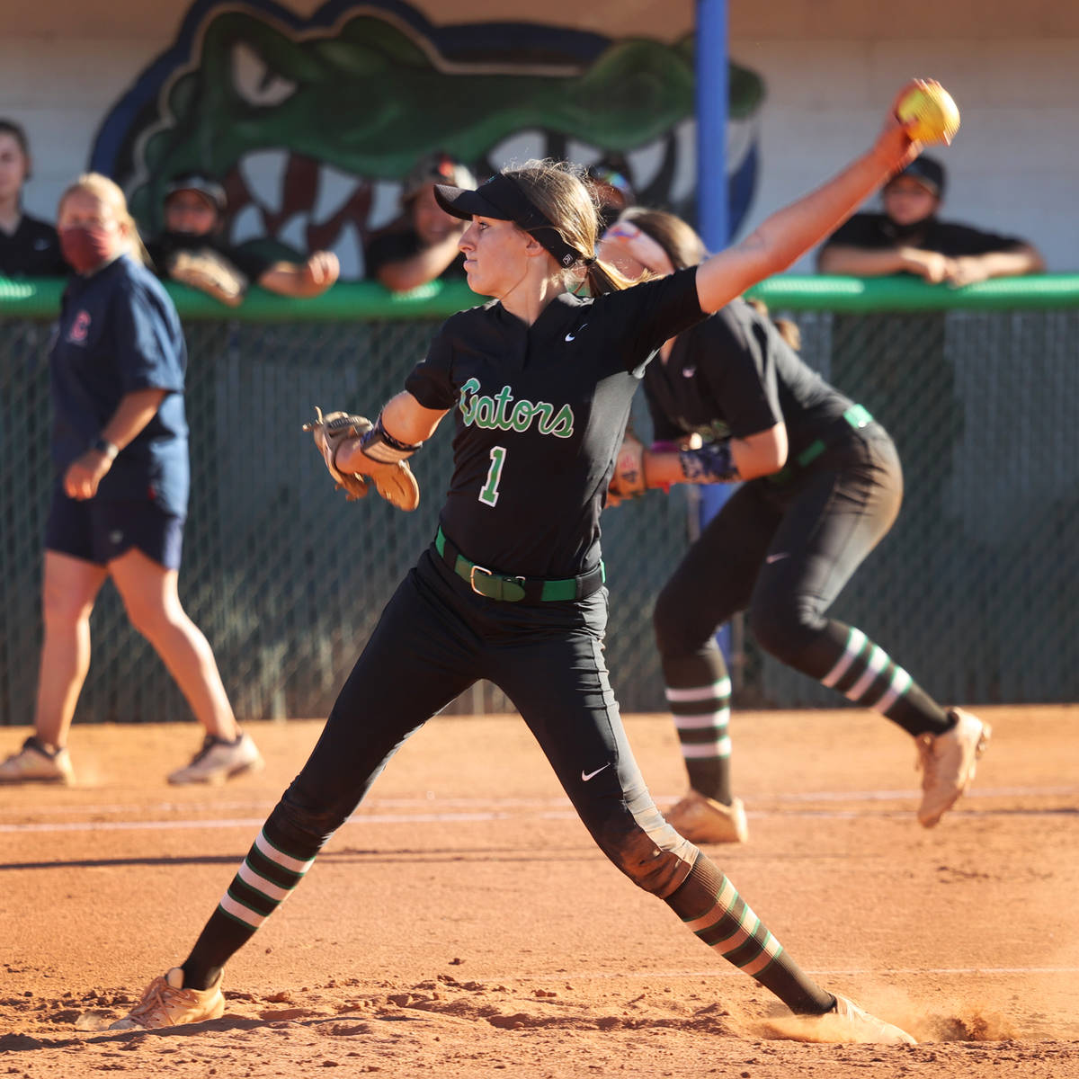 Green Valley's Avari Morris (1) pitches a strike to win the game against Coronado in the sevent ...