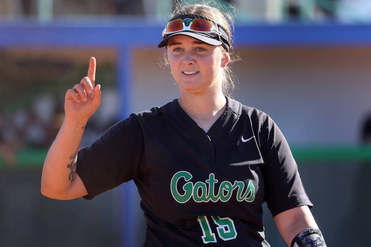 Green Valley's Alicia Ortega (15) gestures to her team after getting an out against Coronado in ...