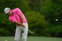 Paul Casey, of England, hits on the 12th hole during the second round of the Masters golf tourn ...