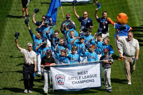 The Mountain Ridge Little League baseball team from Las Vegas participates in the opening cerem ...