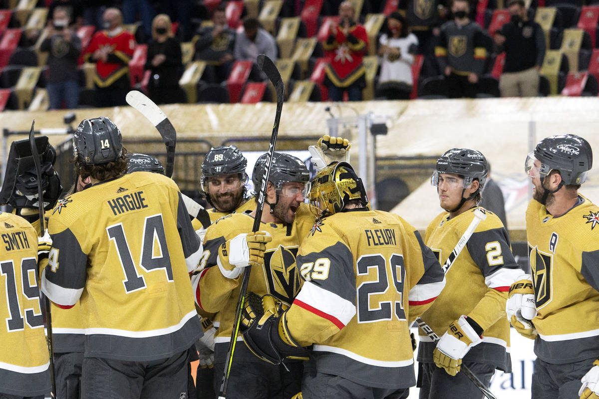 The Golden Knights, including Golden Knights defenseman Alec Martinez (23) and goaltender Marc- ...