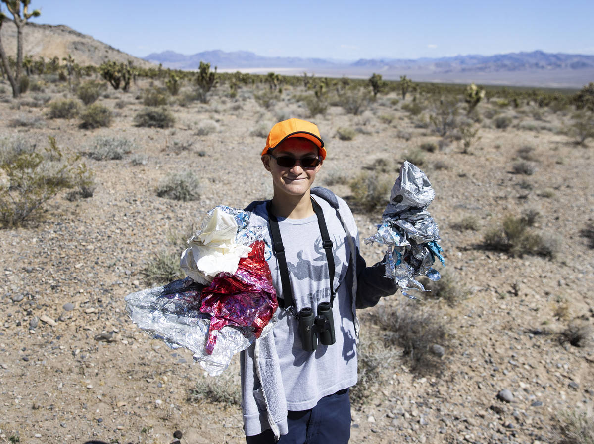 Christian Daniels, 15, displays balloons he found on Saturday, April 17, 2021, in Las Vegas. Ch ...