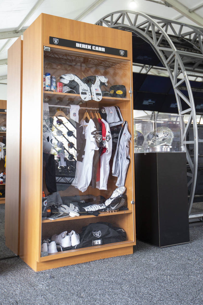Derek CarrÕs name represents the RaidersÕ display inside the NFL Draft Experience loc ...