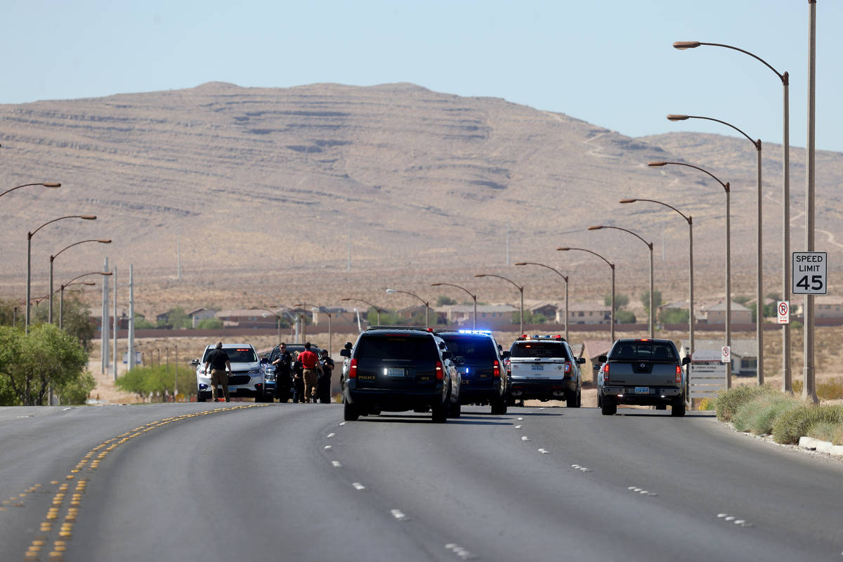 Las Vegas police investigate on Buffalo Drive near Cactus Drive after reports of a gas leak and ...