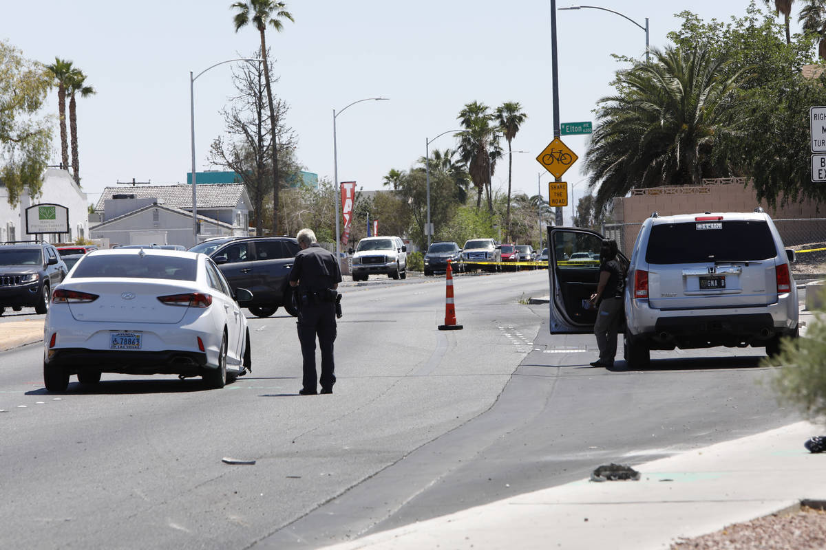 The Nevada Highway Patrol investigates at the crash scene at U.S. Highway 95 and Jones Boulevar ...