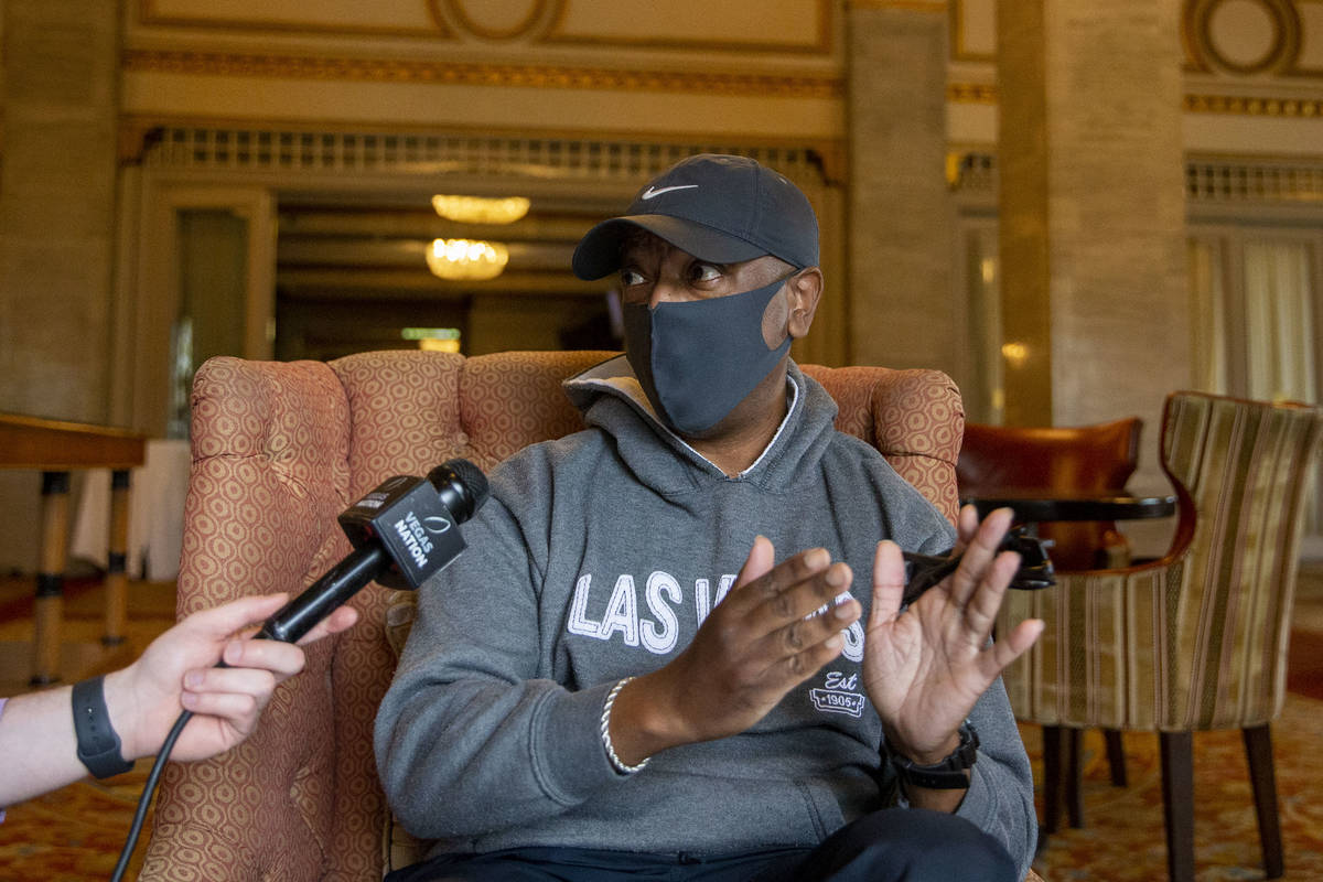 Damascus Russell, husband of RaidersՠFan of the Year Denean Vaughn, is interviewed at the ...