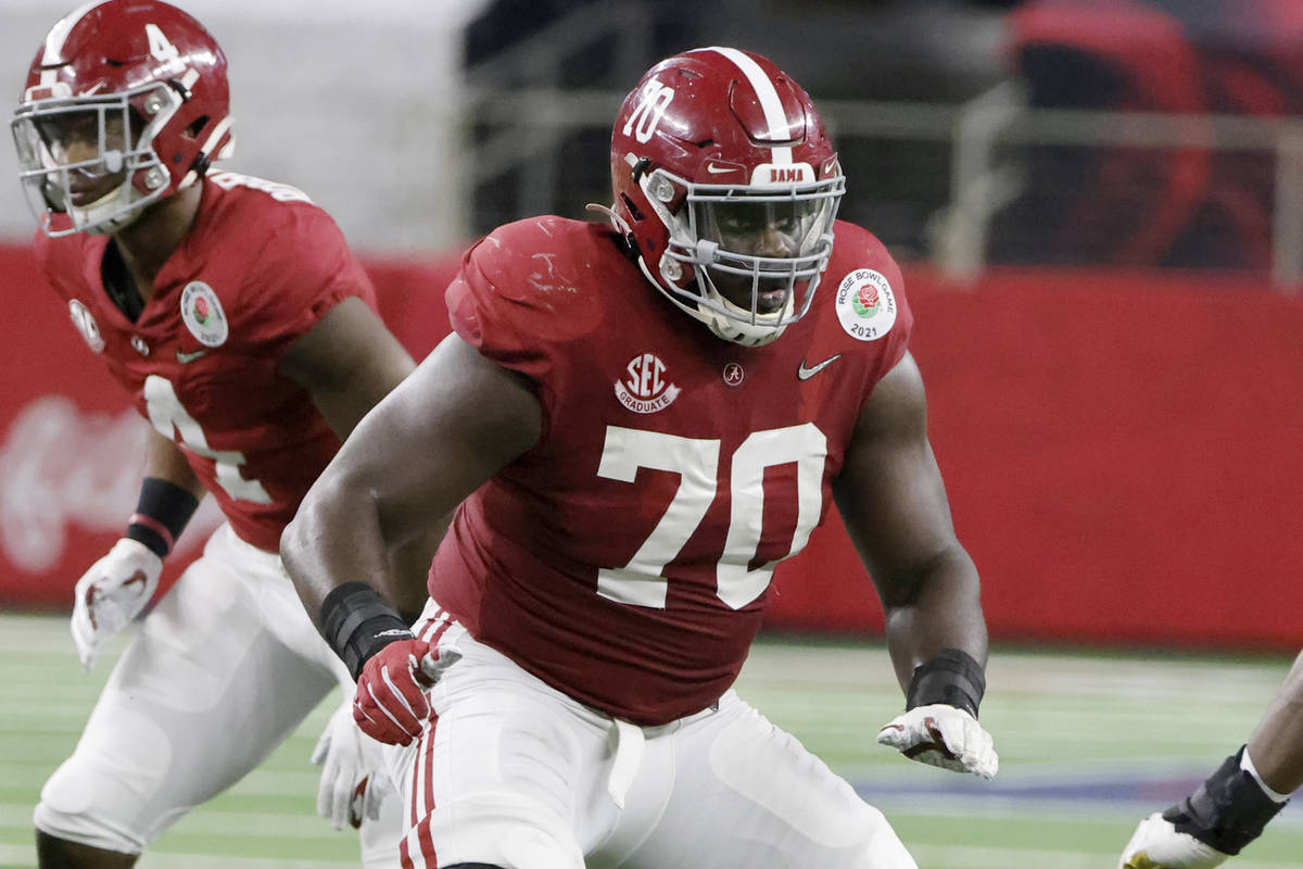 FILE - Alabama offensive lineman Alex Leatherwood (70) prepares to block against Notre Dame dur ...