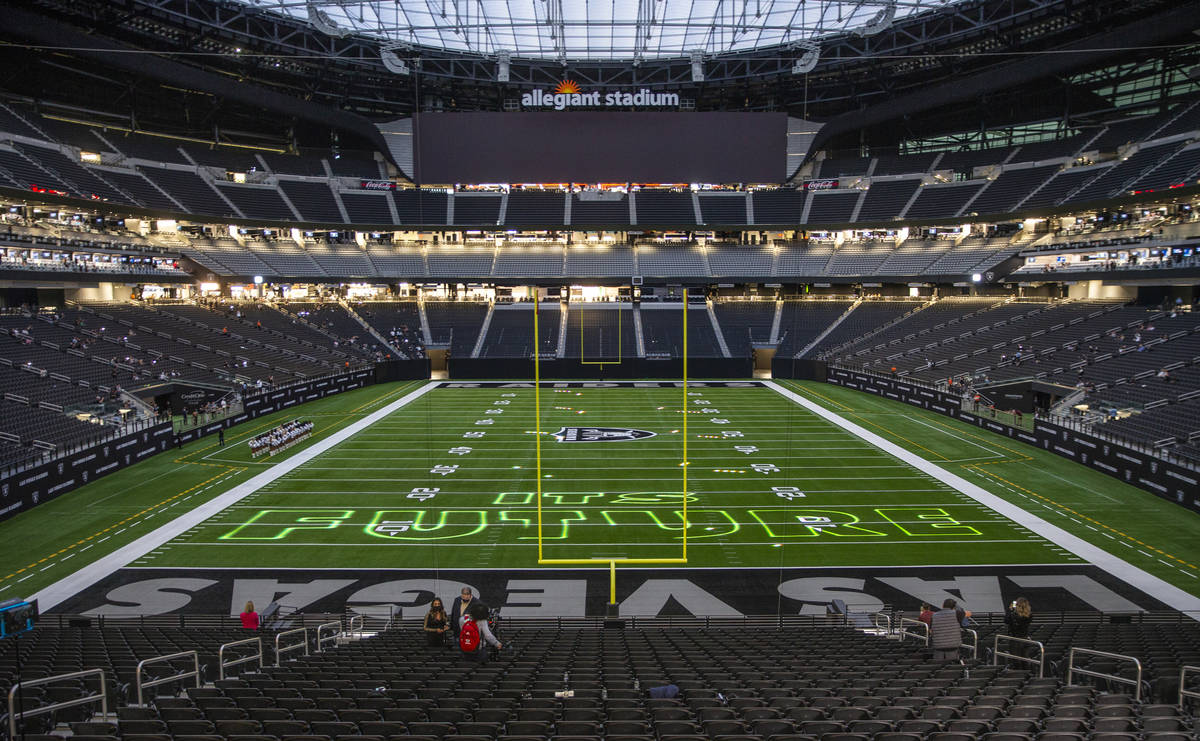 A short light show is projected onto the field during the 2021 Las Vegas Raiders NFL Draft Part ...