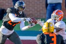 American Team defensive back Richie Grant of UCF (27) grabs an interception against wide receiv ...