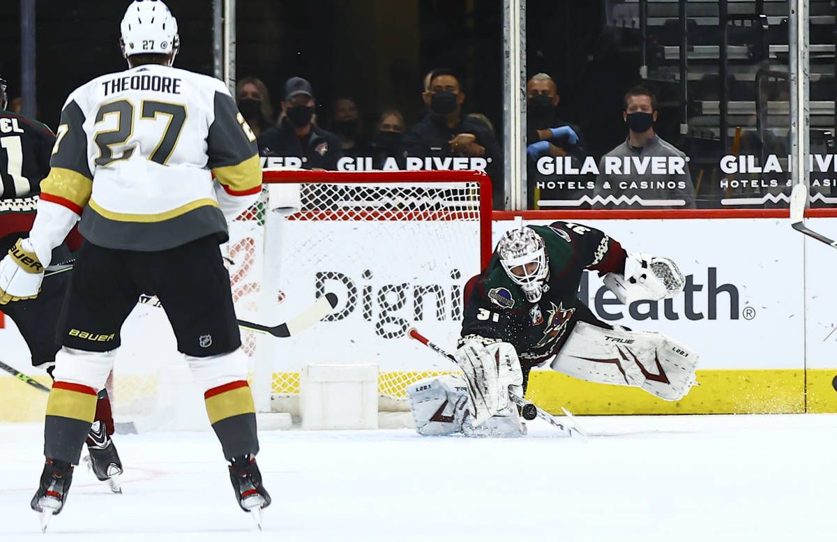 Arizona Coyotes goaltender Adin Hill (31) blocks a shot from the Golden Knights during the seco ...