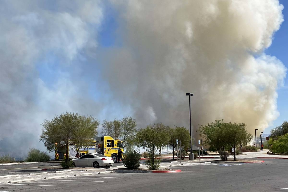 Clark County firefighters were responding to a large brush fire at Sunset Park along Sunset Roa ...