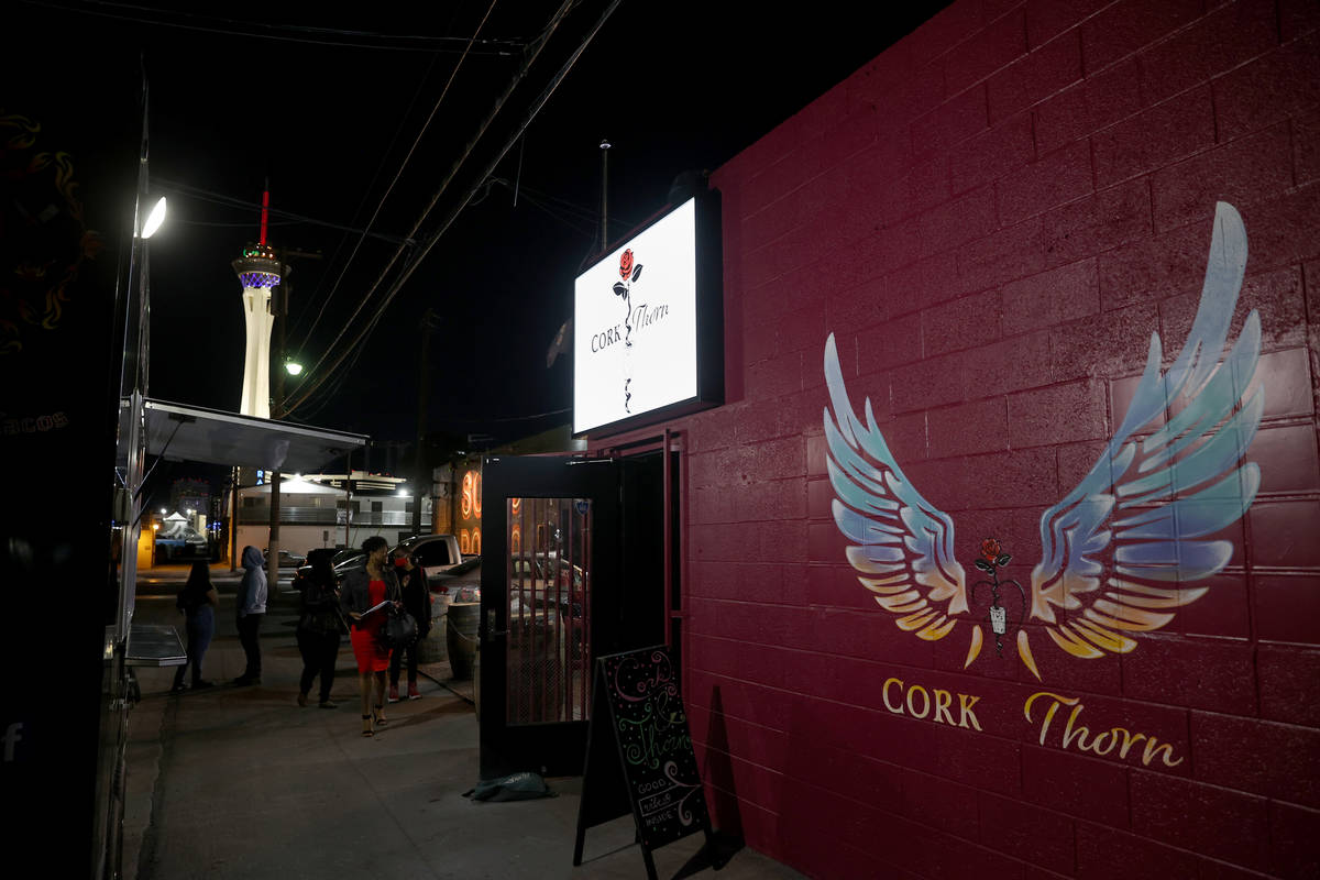 People arrive on reopening night at Cork and Thorn in downtown Las Vegas Sunday, March 21, 2021 ...