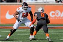 American Team offensive lineman Dan Moore Jr. of Texas A&M (68) prepares to block National ...