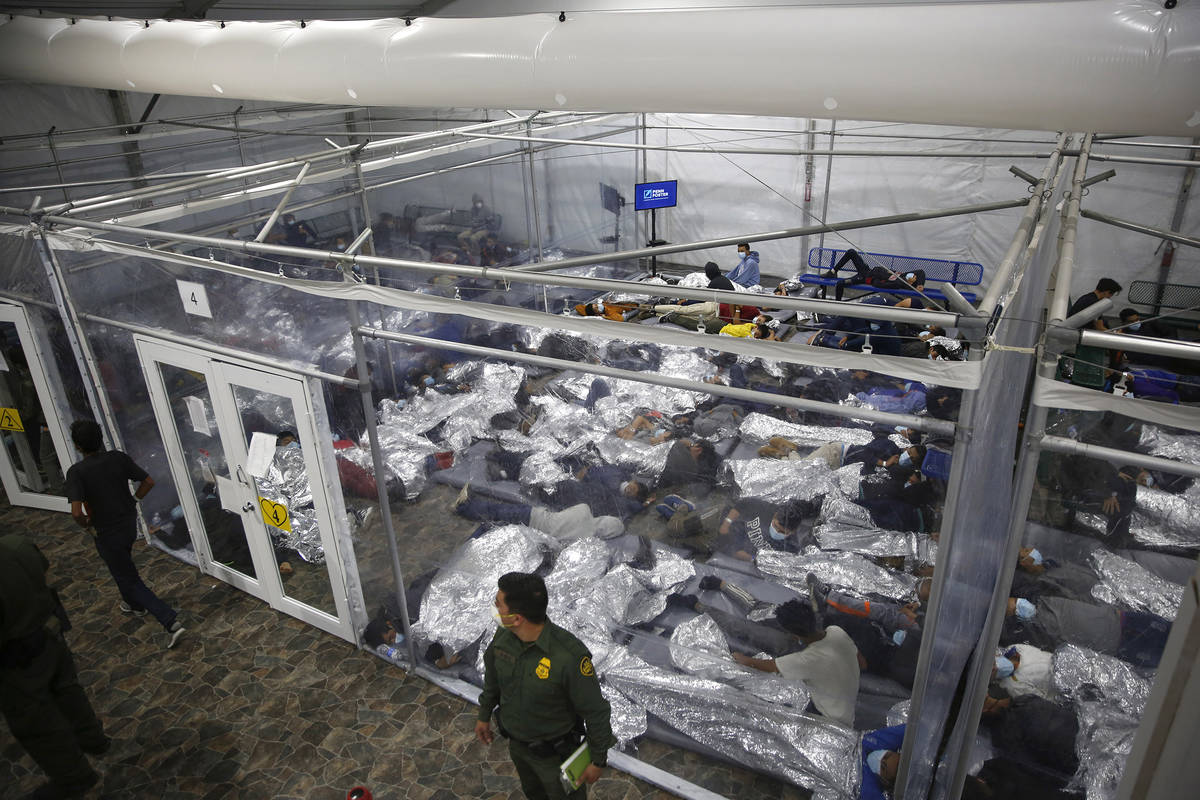 FILE - In this March 30, 2021, file photo, minors inside a pod at the Donna Department of Homel ...