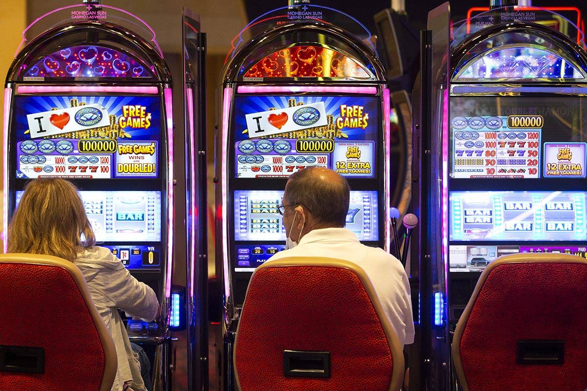 Guests gamble at the Mohegan Sun Casino at Virgin Hotels Las Vegas on Friday, April 30, 2021, i ...
