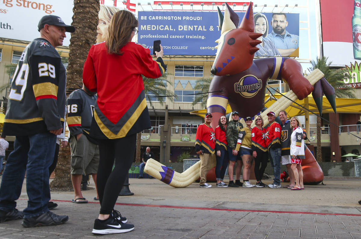 Golden Knights from Las Vegas and Southern California pose for pictures before a road game agai ...