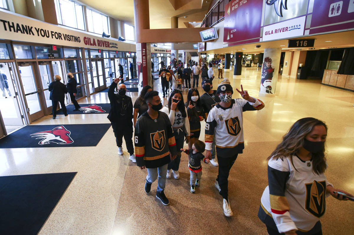 Golden Knights fans arrive for a road game against the Arizona Coyotes at Gila River Arena in G ...