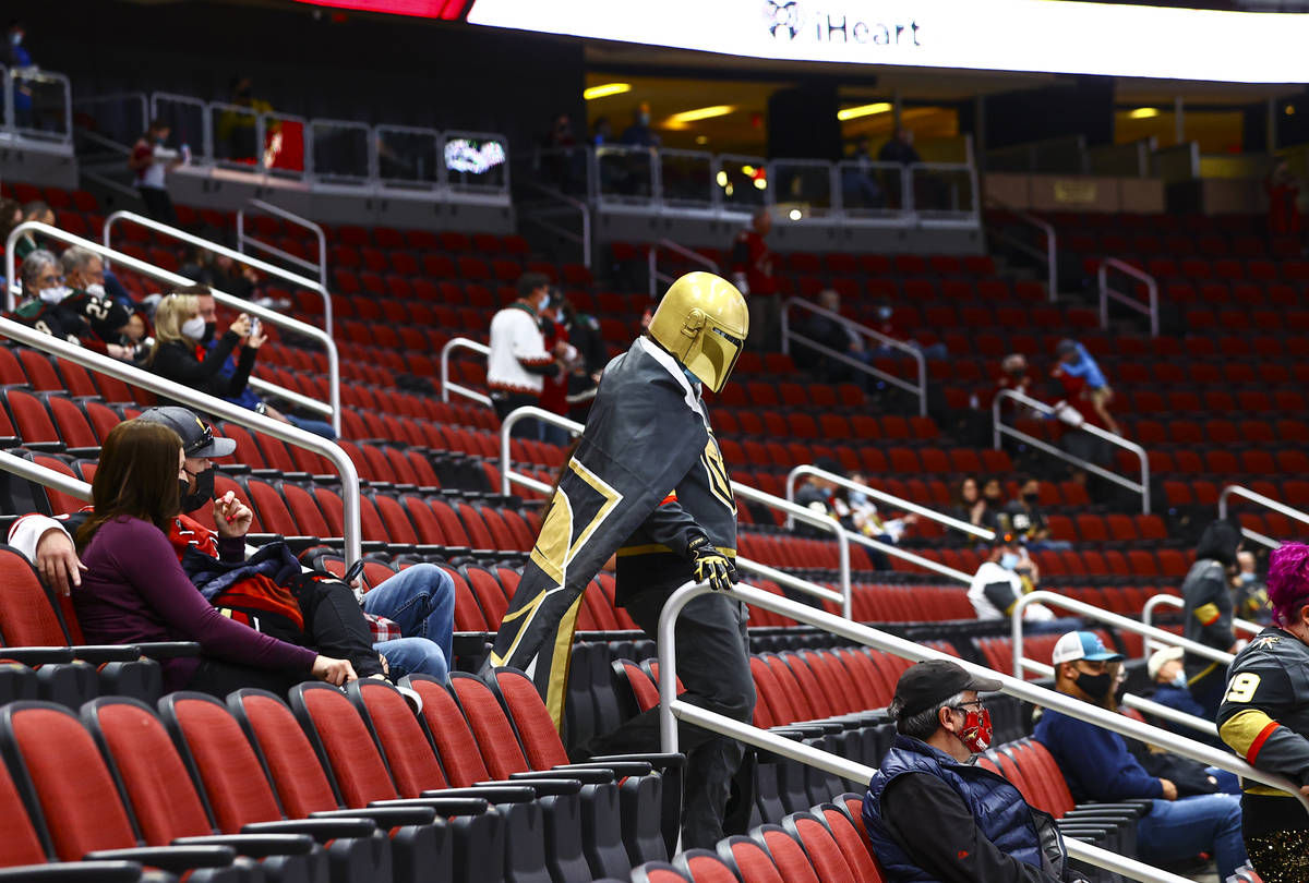 Golden Knights fan Dakota Broughton, of Spokane, Wash., arrives for an NHL hockey game against ...