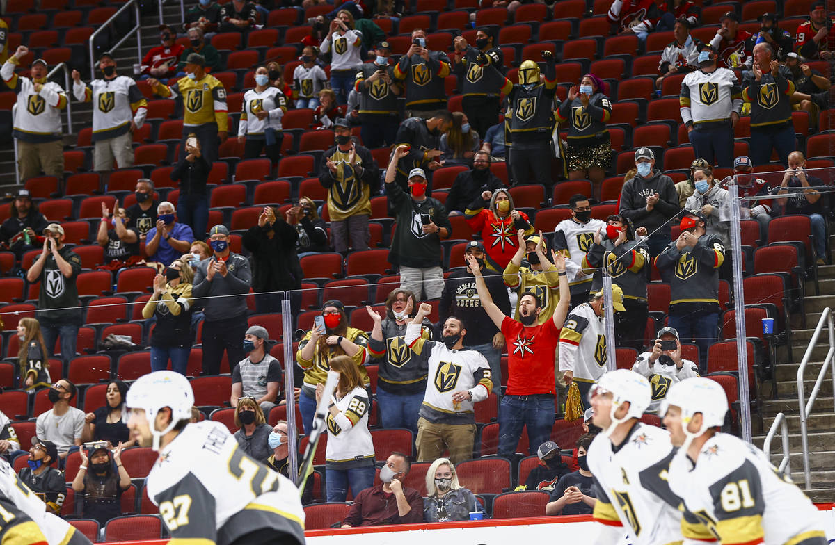 Golden Knights fans celebrate after a goal by William Karlsson, not pictured, during the first ...