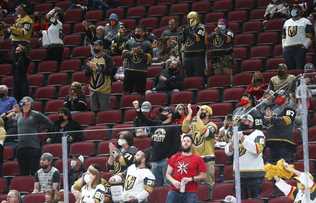 Golden Knights fans cheer after a goal by Mark Stone, not pictured, during the second period of ...