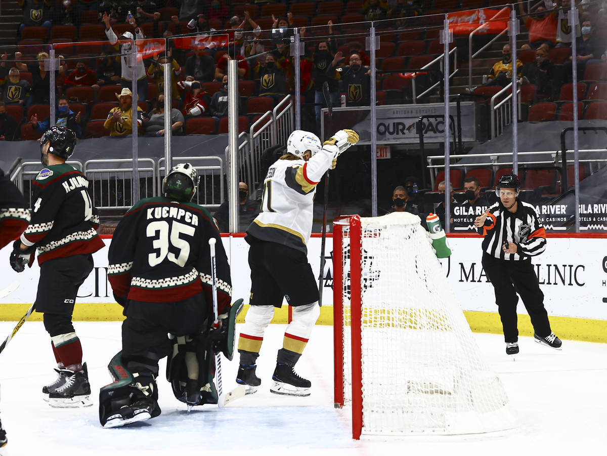 Golden Knights' William Karlsson celebrates his goal against the Arizona Coyotes during the fir ...