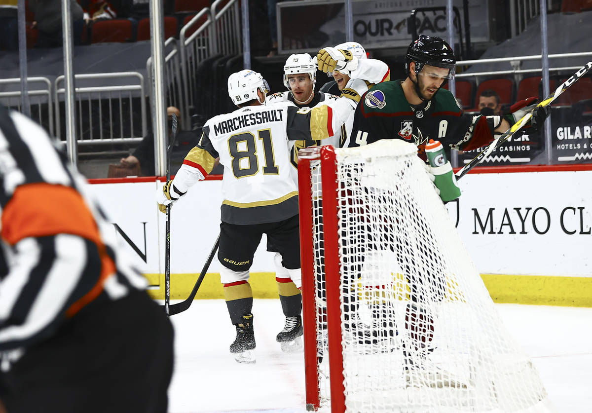 The Golden Knights celebrate a goal by William Karlsson, third from left, during the first peri ...