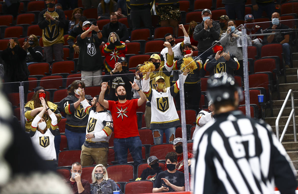 Golden Knights fans celebrate after a goal by William Karlsson, not pictured, during the first ...