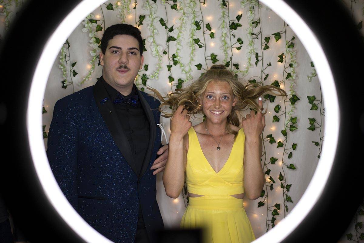 Cayna Love, left, and Renn Evans, both seniors at Coronado High School, dance during a prom for ...