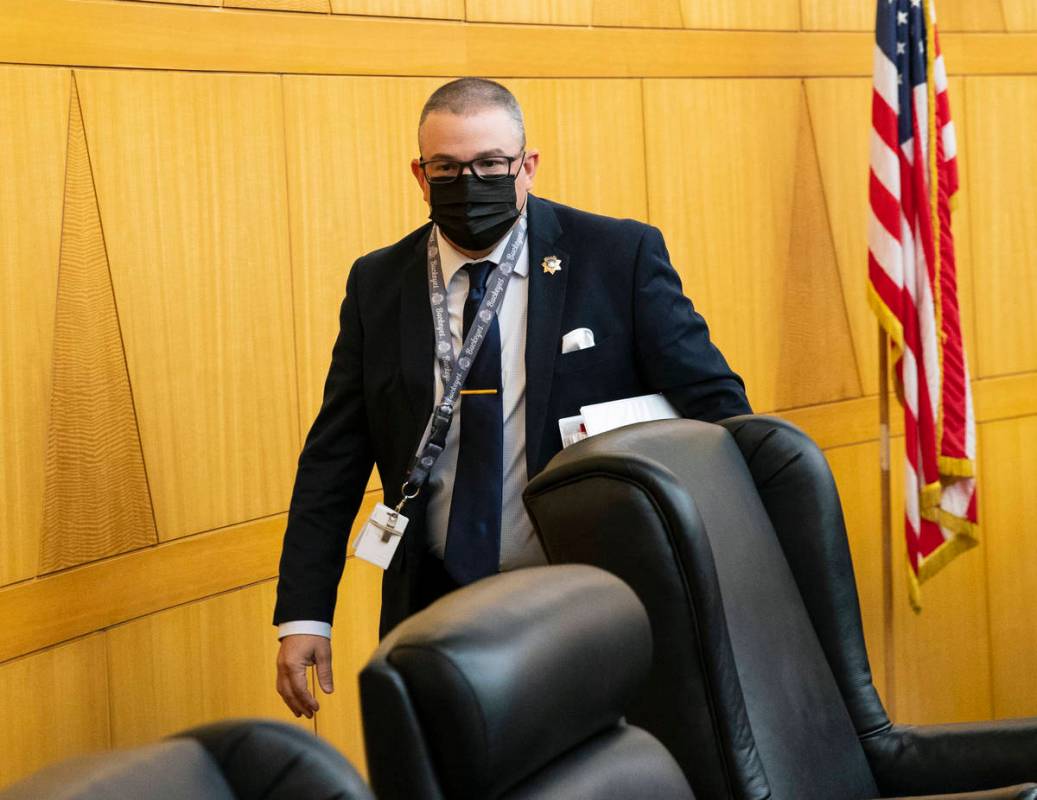 Metropolitan Police Department Detective Blake Penny leaves commission chambers at the Clark Co ...