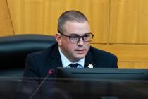 Metropolitan Police Department Detective Blake Penny takes the witness stand inside commission ...