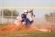Bishop Gorman's Justin Crawford (3) slides into second on an attempted steal while Palo Verde's ...