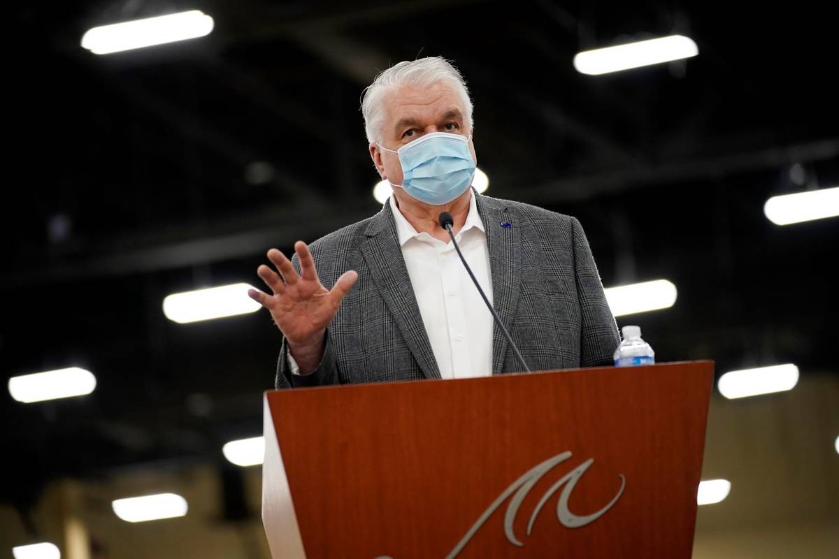 Nevada Governor Steve Sisolak speaks during a news conference about the state's response to cor ...