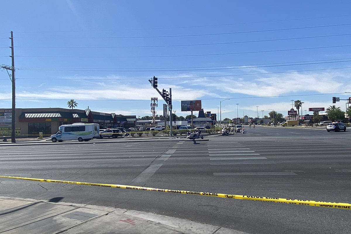 Police investigate a crash involving a bus and a pedestrian Tuesday, May 4, 2021, at the inters ...