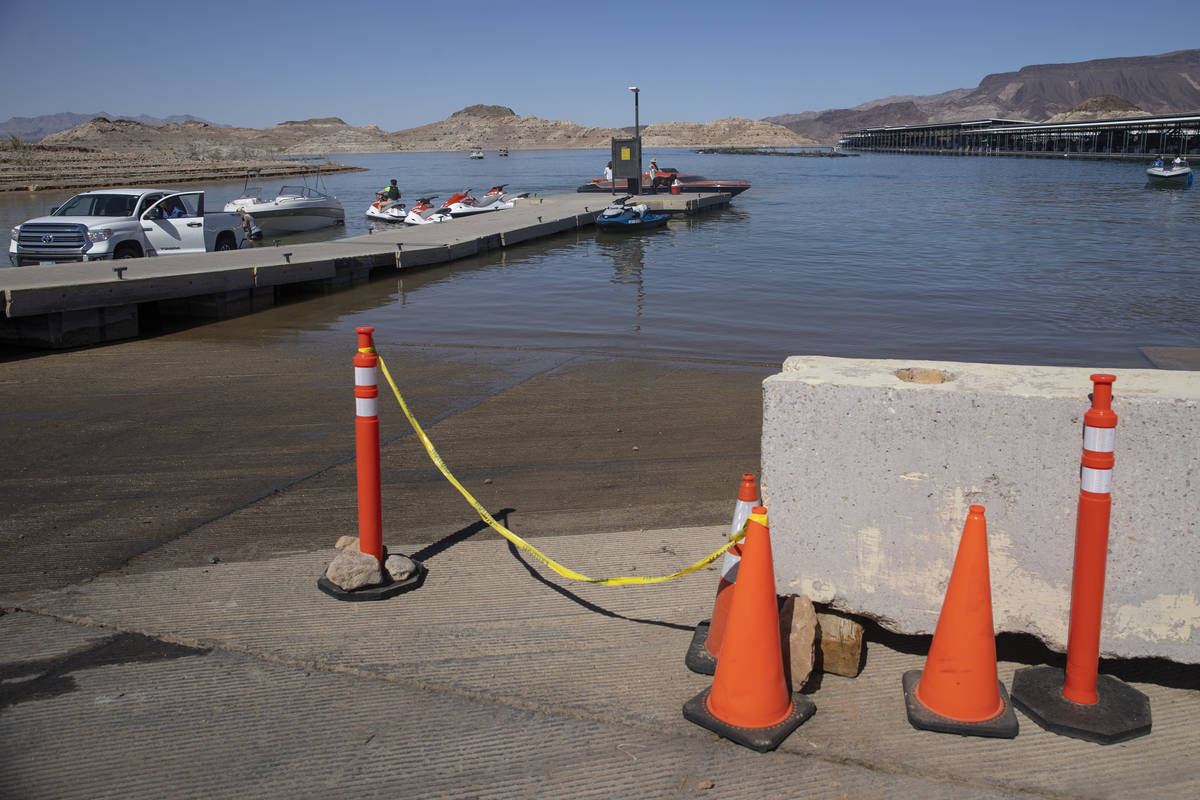 Oranges cones sit near shallow water at the Hemenway Harbor in Boulder City, Wednesday, May 5, ...