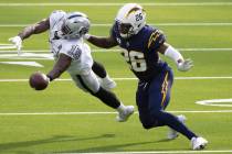 Las Vegas Raiders wide receiver Nelson Agholor (15) leaps to try and make a catch over Los Ange ...