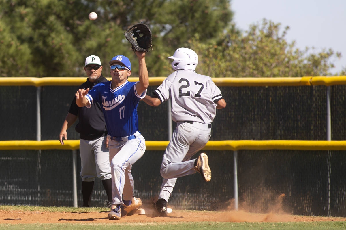 Bishop Gorman first baseman Tai Nguyen (17) reaches to catch the ball as Palo Verde's outfielde ...