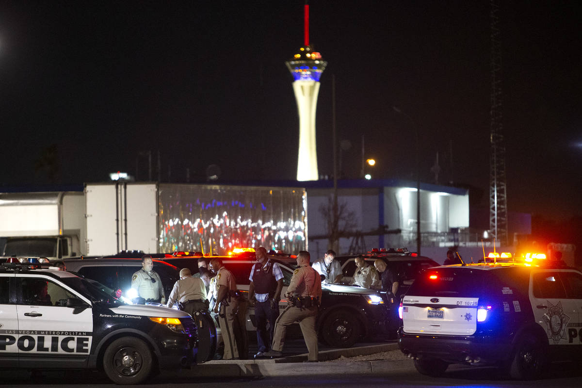 Metropolitan police have an incident command set up in a Lowe's parking lot while they investig ...