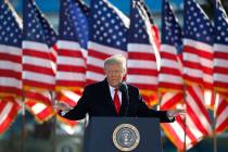 President Donald Trump speaks to crowd before boarding Air Force One at Andrews Air Force Base, ...