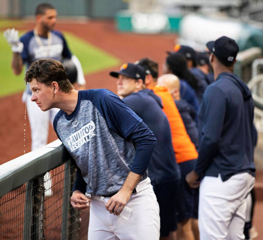 Aviators pitcher Brian Howard, left, cools off during practice at Las Vegas Ballpark on Tuesday ...