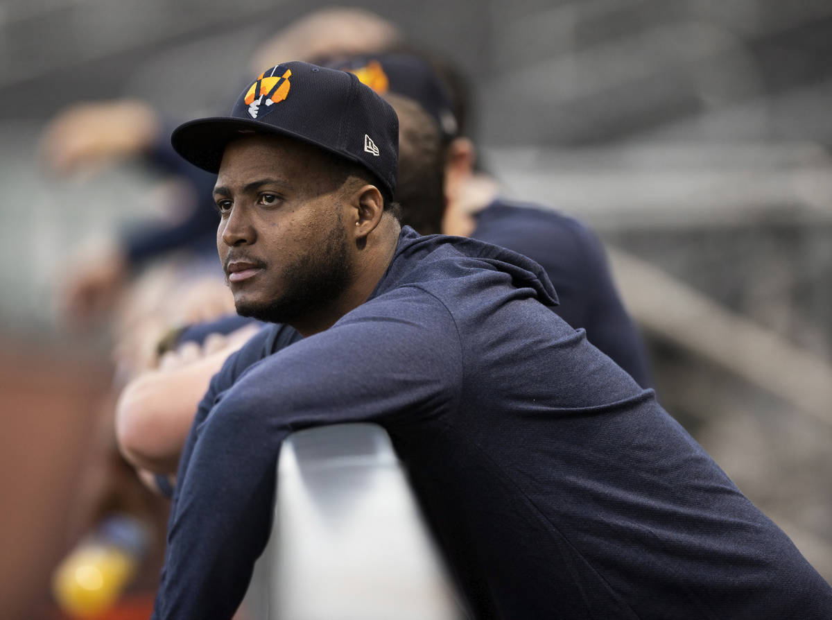 Aviators pitcher Domingo Acevedo watches practice from the dugout at Las Vegas Ballpark on Tues ...